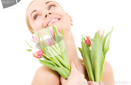 Image of happy woman with flowers