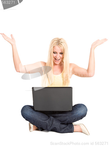 Image of Happy young student with laptop