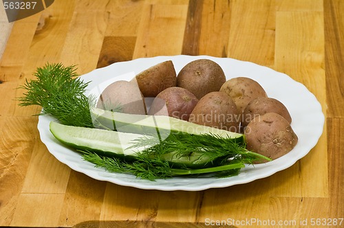 Image of Potatoes, salt cucumber and dill still-life