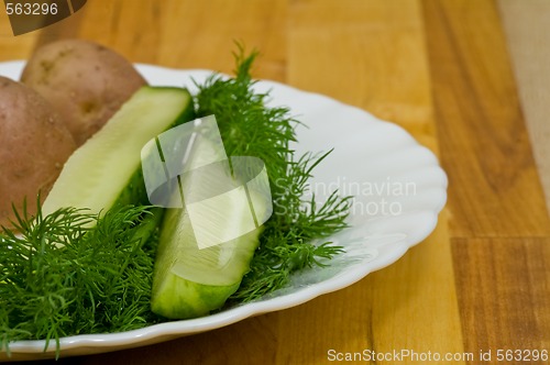 Image of Potatoes, salt cucumber and dill still-life