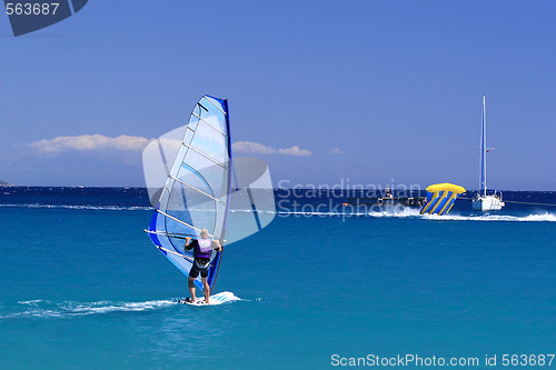 Image of man wind surfing 