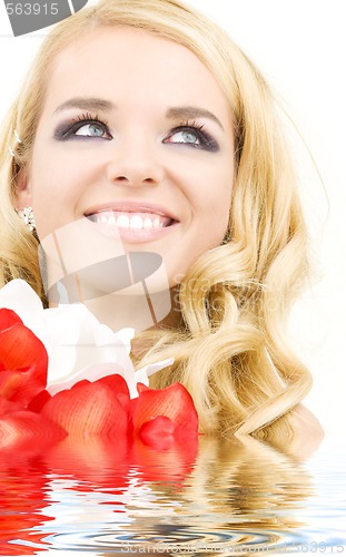 Image of happy woman with lily flowers