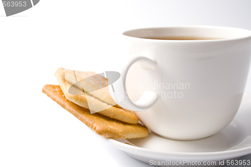 Image of cup of tea and some cookies