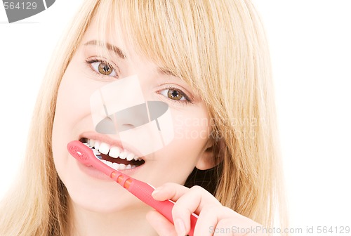 Image of happy girl with toothbrush