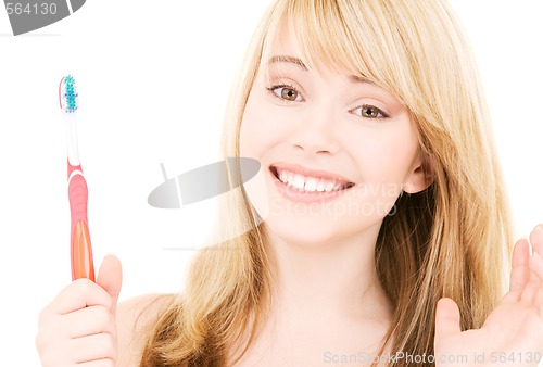 Image of happy girl with toothbrush