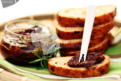 Image of bread with dry tomatoes