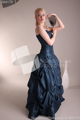 Image of Young woman with prom dress