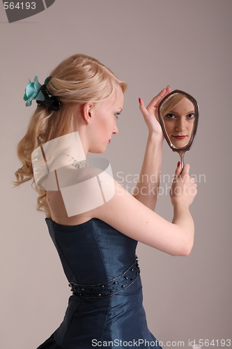Image of Young woman with prom dress