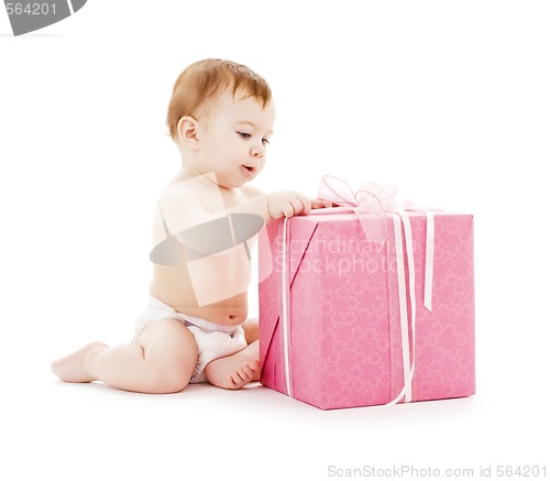 Image of baby boy with big gift box