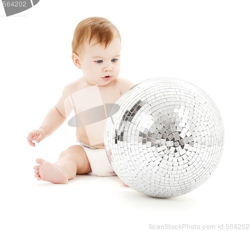 Image of adorable baby boy with big disco ball