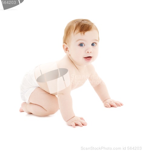 Image of crawling baby boy in diaper