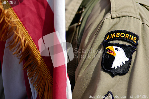 Image of US soldier and flag of Airborne division