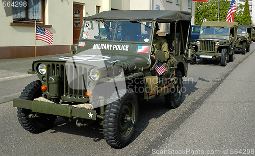 Image of three old MP Jeep