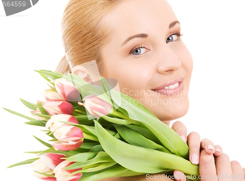 Image of happy woman with flowers