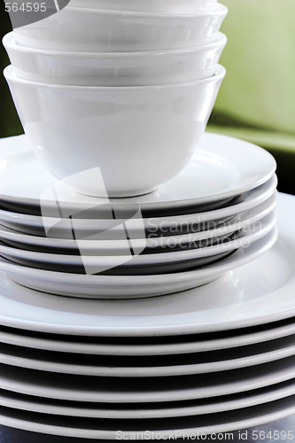 Image of Stack of White Plates and Bowls