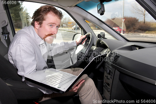 Image of driver using gps laptop