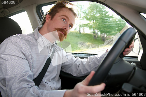 Image of Businessman in the car