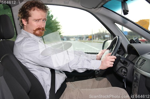 Image of Businessman in the car