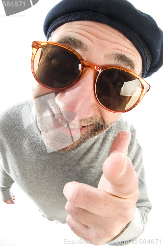 Image of aging artist thinking distorted nose close up beret hat smiling 