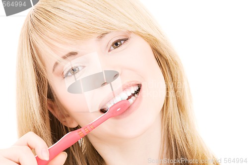 Image of happy girl with toothbrush