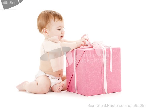 Image of baby boy with big gift box