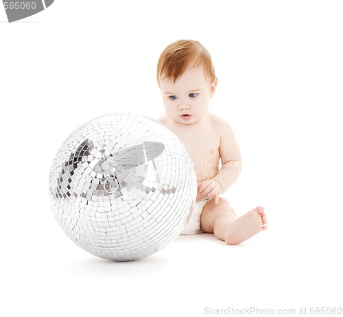 Image of adorable baby boy with big disco ball