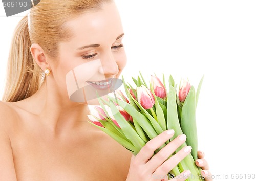 Image of happy woman with flowers