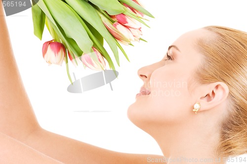 Image of happy woman with flowers