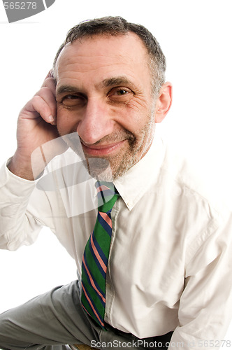 Image of business man senior on cell phone