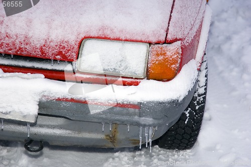 Image of Snow covered car