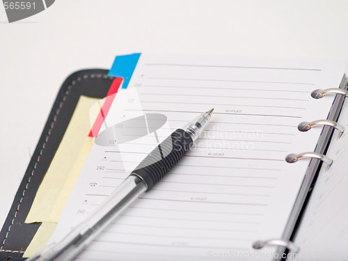 Image of Office stationary - Pen and diary on white