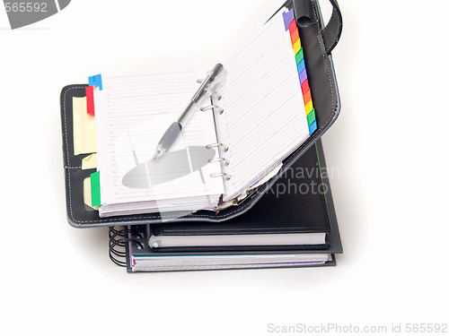 Image of Office stationary - Pen and diary on white