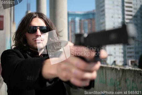 Image of man with gun
