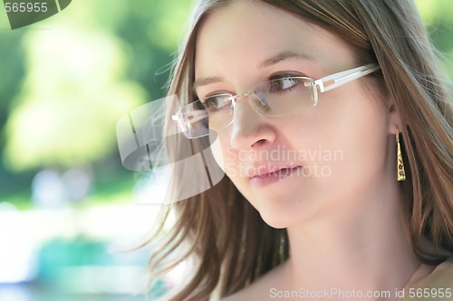 Image of young girl in glasses