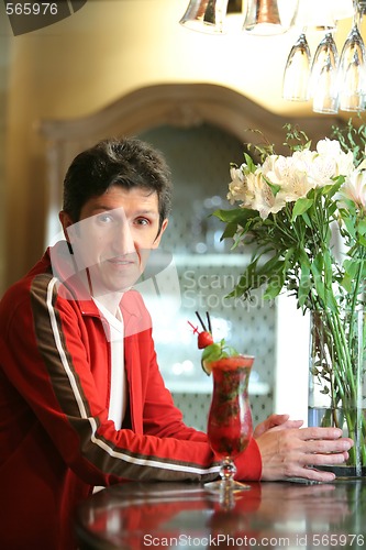 Image of Man in Red with Goblet Red Mohito