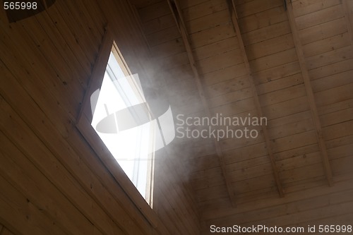 Image of Light and steam coming through a window