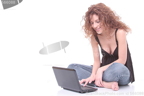 Image of young woman using laptop