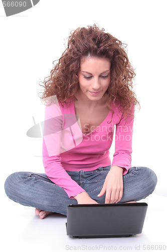 Image of young woman using laptop