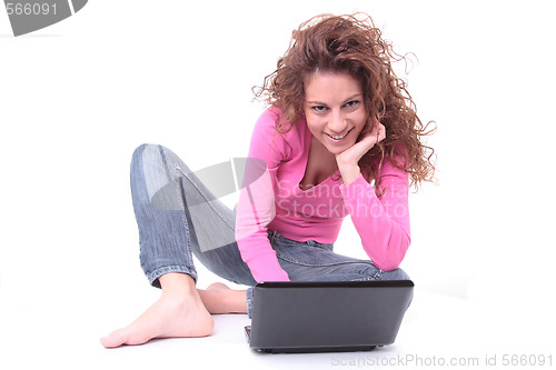 Image of young woman using laptop