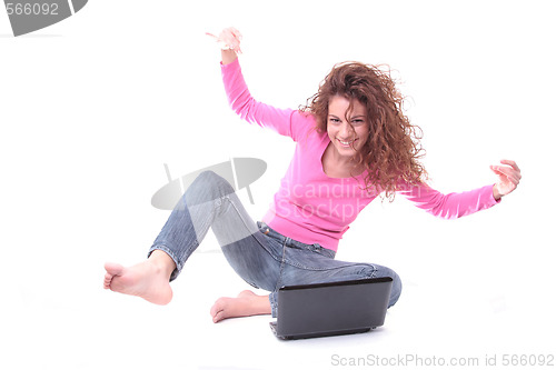 Image of young woman using laptop
