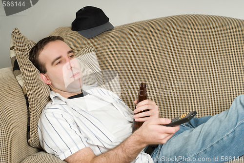 Image of Male With Beer Watching TV