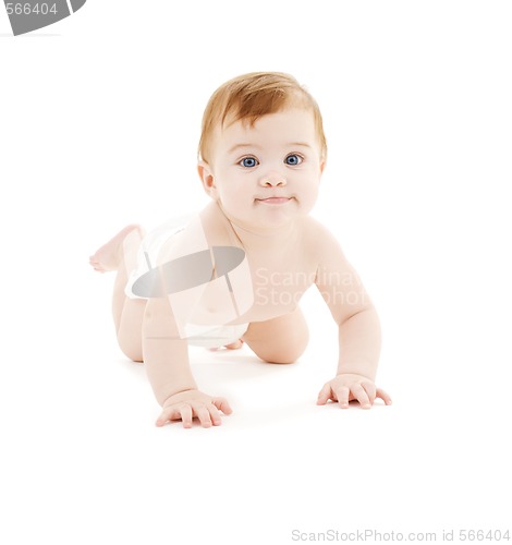 Image of crawling baby boy in diaper