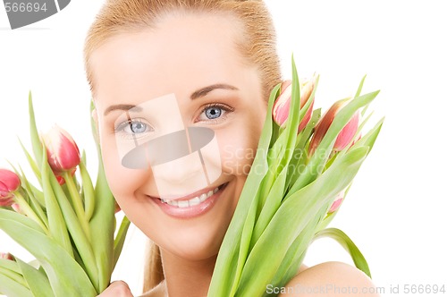 Image of happy woman with flowers