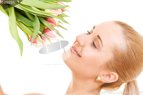 Image of happy woman with flowers