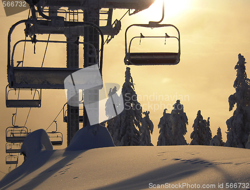 Image of Chair lift in sunset