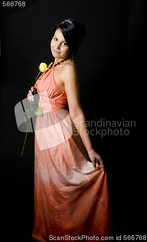 Image of sexy young woman dress with rose flower