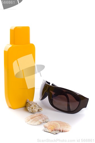 Image of sunglasses and lotion