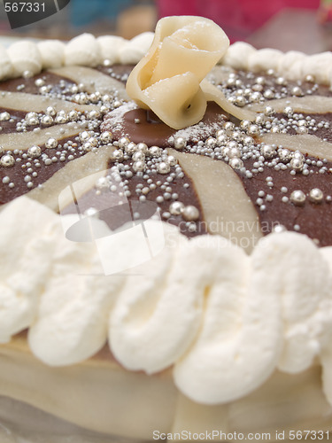 Image of Delicous sweet layer cake with  chocolate icing