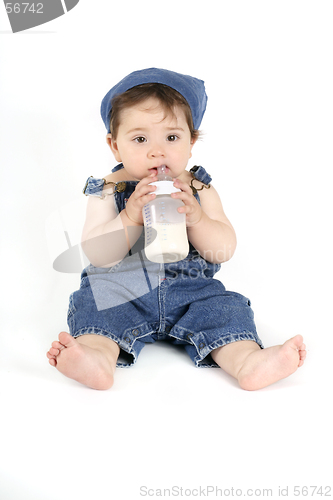 Image of Baby with a milk bottle