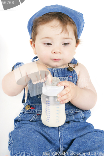 Image of Sitting baby with milk